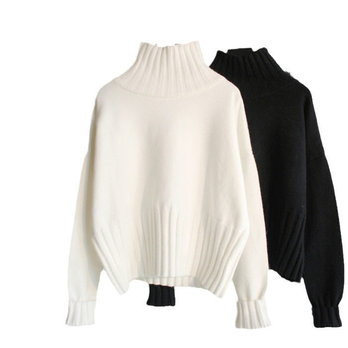 Damen Oversized Rollkragenpullover mit geschlitzten Ärmeln und Rippstruktur
