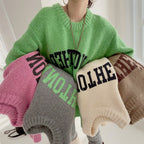 Damen Oversized Pullover mit auffälligem Schriftzug und gestricktem Muster