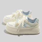 Damen Sneaker mit verspieltem Schleifenmotiv und bequemer Dämpfung