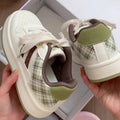 Damen Sneakers mit Karo-Muster und gepolsterter Sohle