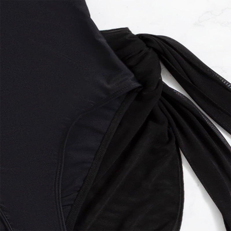 Damen einteiliger Badeanzug mit elegantem Wickelrock