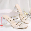 Damen Glamouröse Sandalen mit transparenten Riemen und goldenen Nieten
