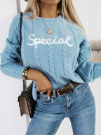 Damen Strickpullover mit Zopfmuster und eingesticktem Schriftzug