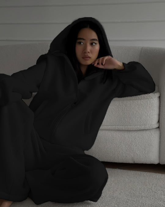 Damen lässiger Jumpsuit mit Kapuze und Reißverschluss R&B