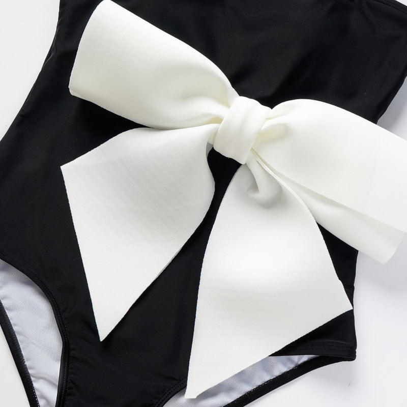 Damen Einteiler Badeanzug mit eleganter Schleifenapplikation R&B