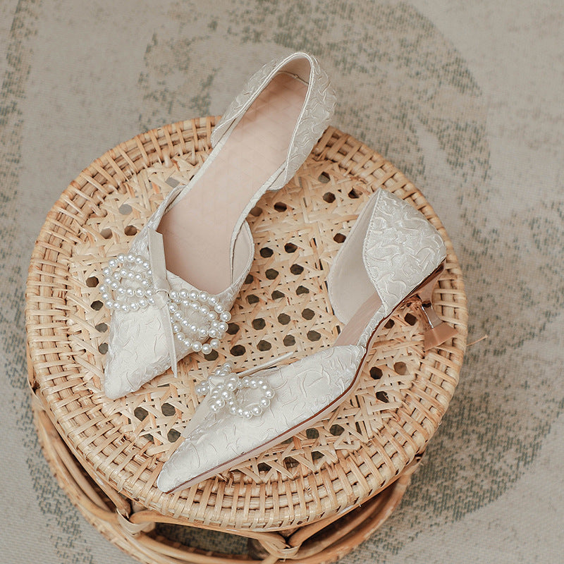 Damen elegant gestaltete Slingback-Pumps mit perlverziertem Schleifendetail