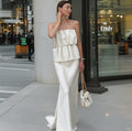 Damen Abendkleid mit schulterfreiem Oberteil und fließendem Saum