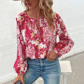 Damen Bluse mit floralem Design und modischer Knotenoptik