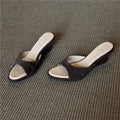 Damen elegante Keil-Mules mit geschwungener Sohle