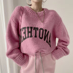 Damen Oversized Pullover mit auffälligem Schriftzug und gestricktem Muster