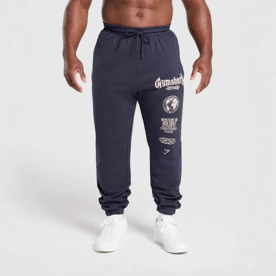 Herren nan konisch geschnittene Baumwollfleece-Sweathose mit elastischem Kordelbund gerippten Beinabschlüssen und großflächigem Logodruck R&B