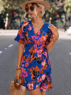 Damen Wickelkleid mit floralen Akzenten und elegantem Taillengurt R&B