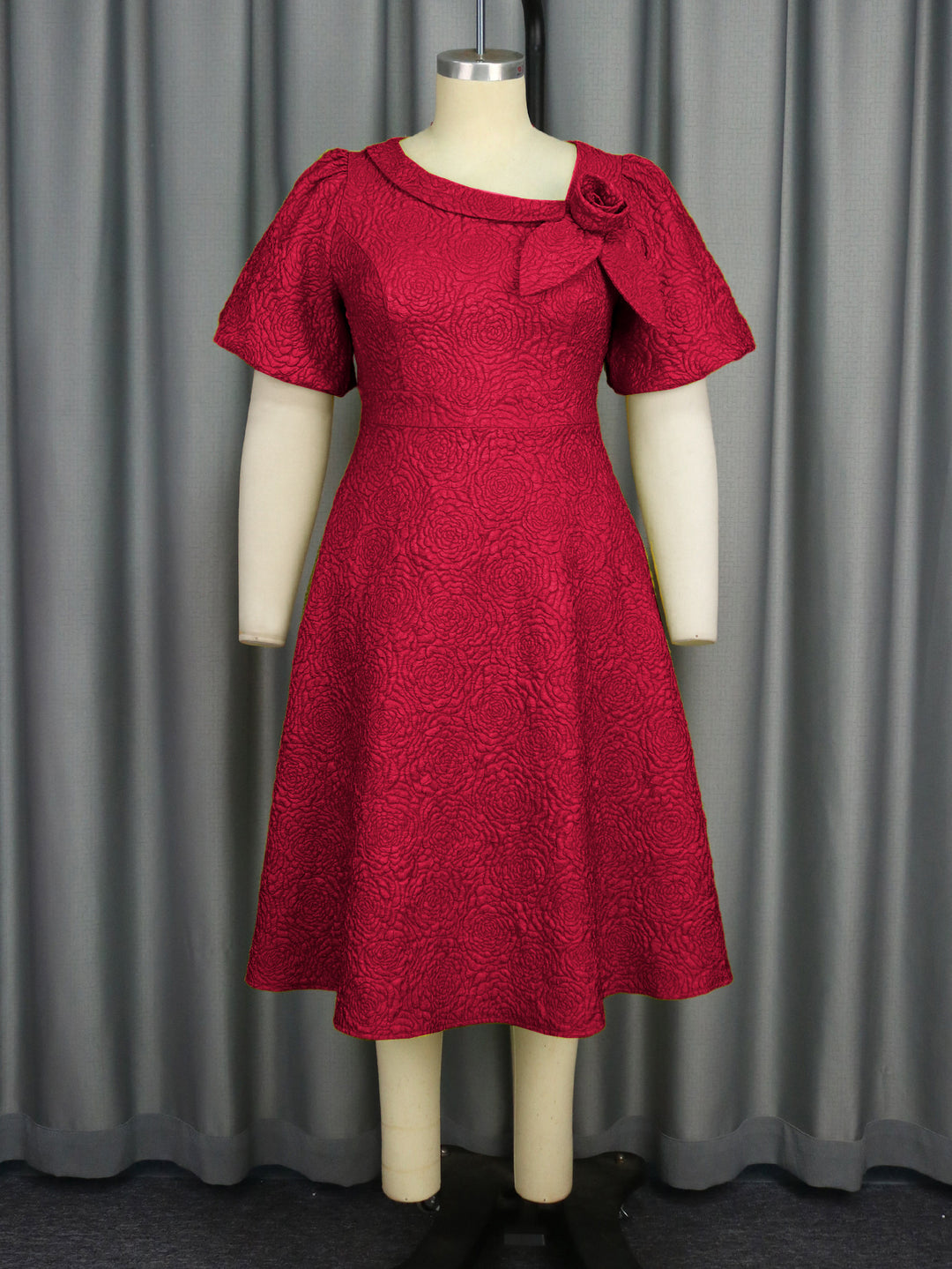 Damen Kleid mit elegantem Blumendruck und dekorativer Schleifenverzierung R&B