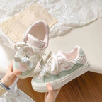 Damen Verspielte Sneakers mit dekorativem Schleifen-Design Heidi Mode