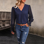 Damen Bluse mit transparenten Puffärmeln und V-Ausschnitt