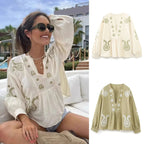 Damen nan bestickte Tunika-Bluse mit Paisley-Stickereien, V-Ausschnitt und voluminösen Ballonärmeln R&B