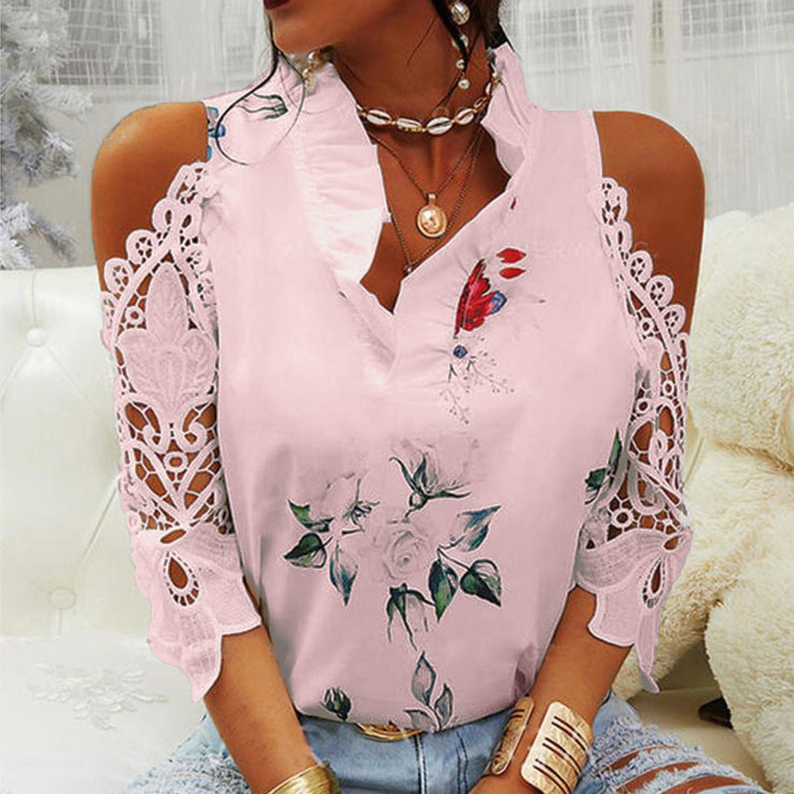 Damen Bluse mit Cut-Out-Ärmeln und floralem Design