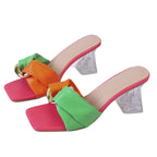 Damen Elegante Mules mit modischer Schleifen-Applikation und transparentem Blockabsatz