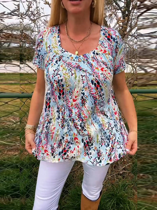 Damen Kurzarmbluse mit floralem Muster und raffiniertem Schnitt Heidi-Mode