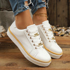 Damen Sneakers mit goldenen Akzenten R&B