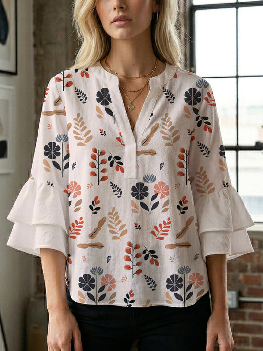 Damen Bluse mit voluminösen Rüschenärmeln und modernem Motiv R&B