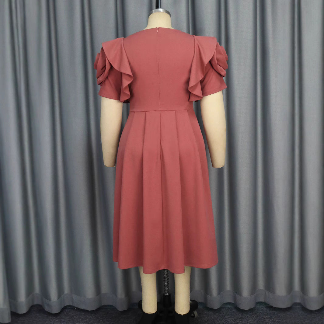 Damen Kleid mit voluminösen Rüschensäumen und eleganter Taillenschließe R&B
