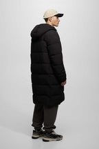 Damen gesteppte Wintermantel mit Kapuze und praktischen Taschen Hedi-Mode