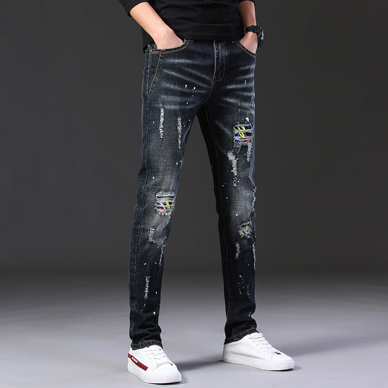 Herren Slim Fit Jeans mit kreativen Rissdesign und Farbklecksen R&B