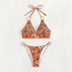 Damen Triangel-Bikini mit modischem Blütenmuster und eleganten Ringdetails