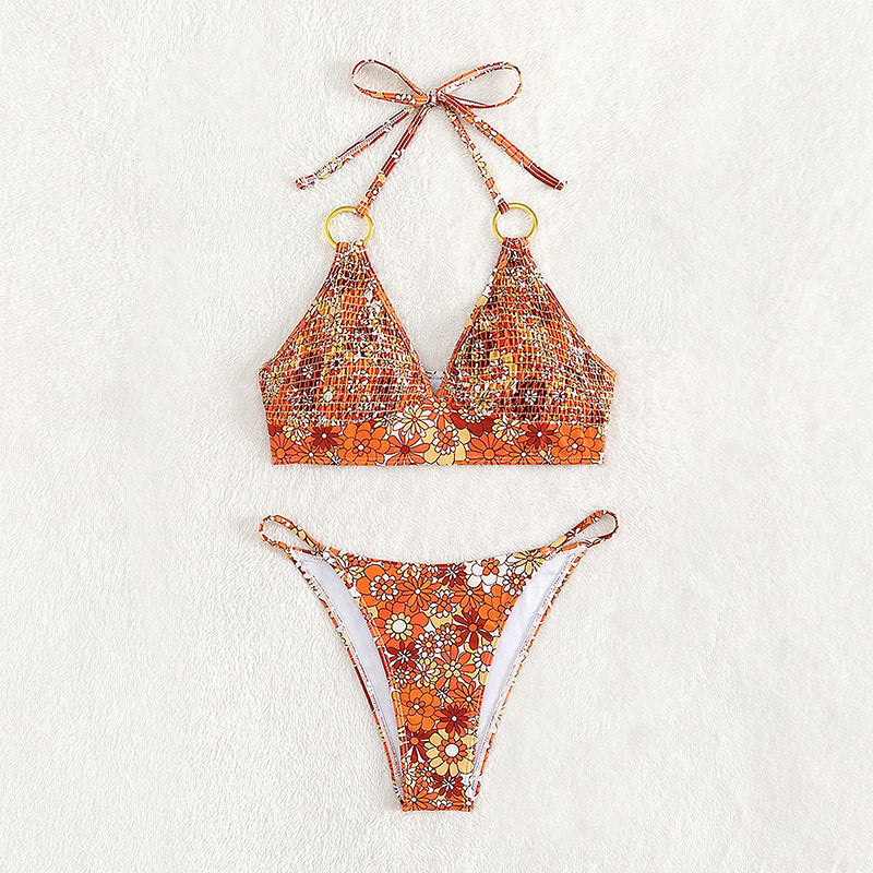 Damen Triangel-Bikini mit modischem Blütenmuster und eleganten Ringdetails