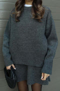 Damen bequemer Strickpullover mit überschnittenen Schultern und modischem Saum