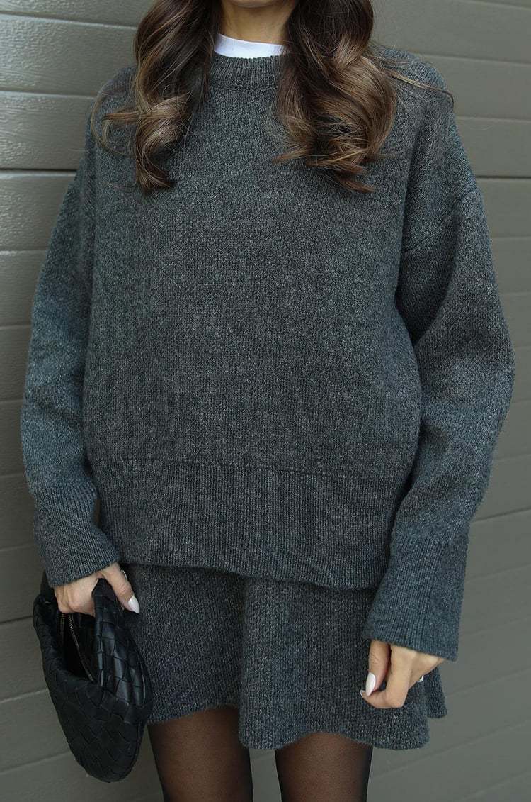 Damen bequemer Strickpullover mit überschnittenen Schultern und modischem Saum