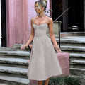 Damen Midikleid mit elegantem Bustier-Oberteil und fließendem Rock R&B