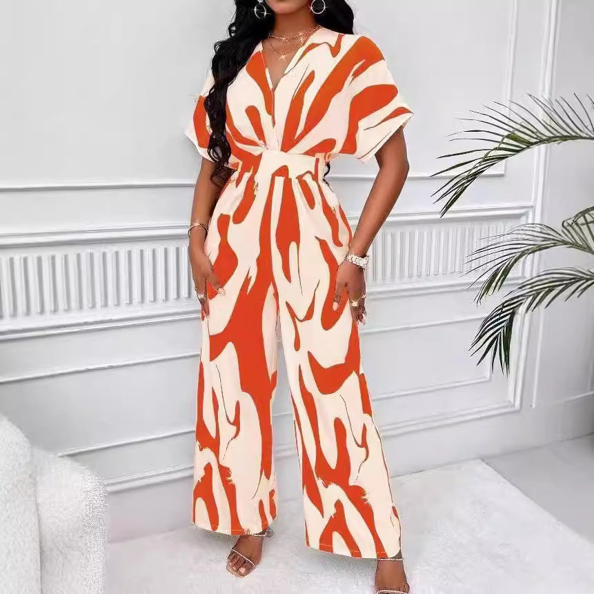 Damen Eleganter Jumpsuit mit großflächigem Muster und V-Ausschnitt R&B