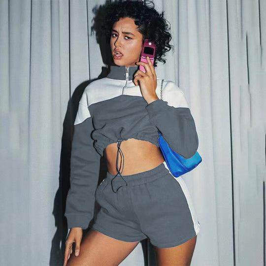 Damen modernes Sportoberteil mit kurzem Schnitt und dazu passender Shorts R&B