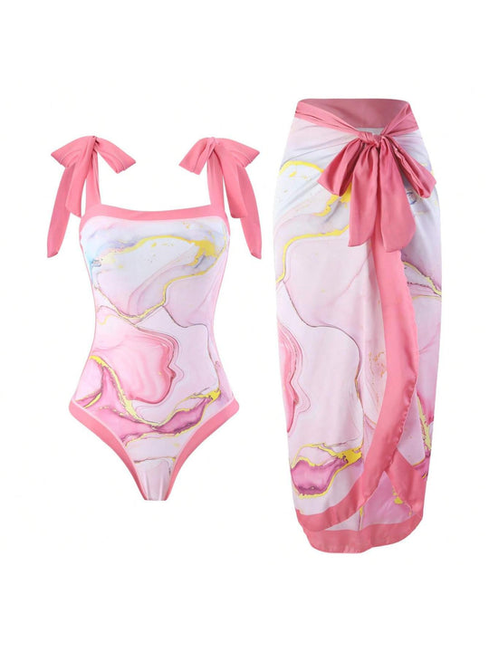 Damen Eleganter Badesuit mit floralen Akzenten und modischem Wickelrock R&B