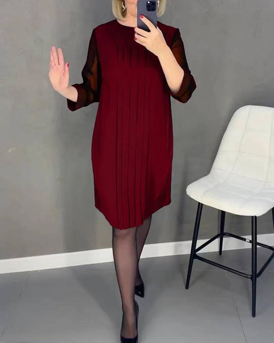 Damen Plissee Abendkleid mit transparenten Ärmeln und elegantem Schnitt Heidi-Mode