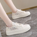 Damen Sneakers aus feiner Spitze mit Plateausohle