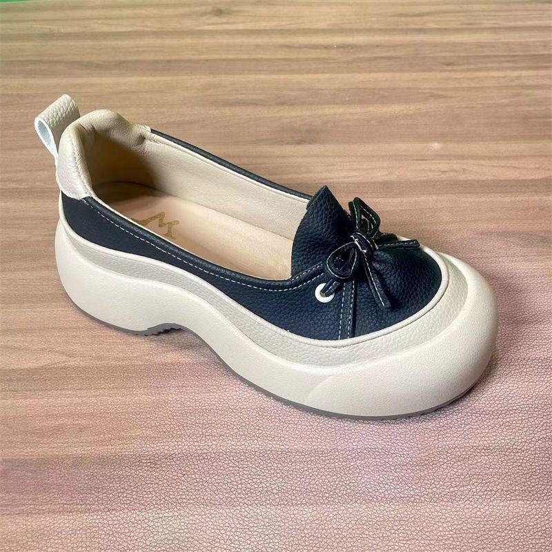 Damen Sleek Casual Slipper mit ausgeprägter Plateau-Sohle und modischem Bindegarn