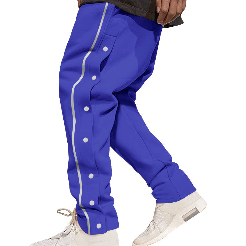 Herren nan weite Trackpants mit seitlicher Druckknopfleiste, elastischem Bund und reflektierendem Streamline-Streifen R&B
