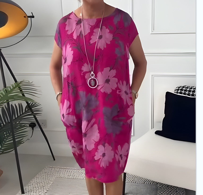 Damen Leichtes Strandkleid mit floralem Muster und Taschen Heidi-Mode
