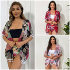 Damen Strandkleid mit floralem Design und fransenverziertem Überwurf R&B