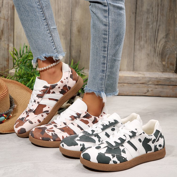 Damen Sportliche Sneakers mit trendigem Kuhdesign R&B