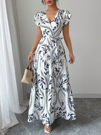 Damen Maxikleid im boho-inspirierten Design mit floralen Elementen und taillierbarem Gürtel R&B