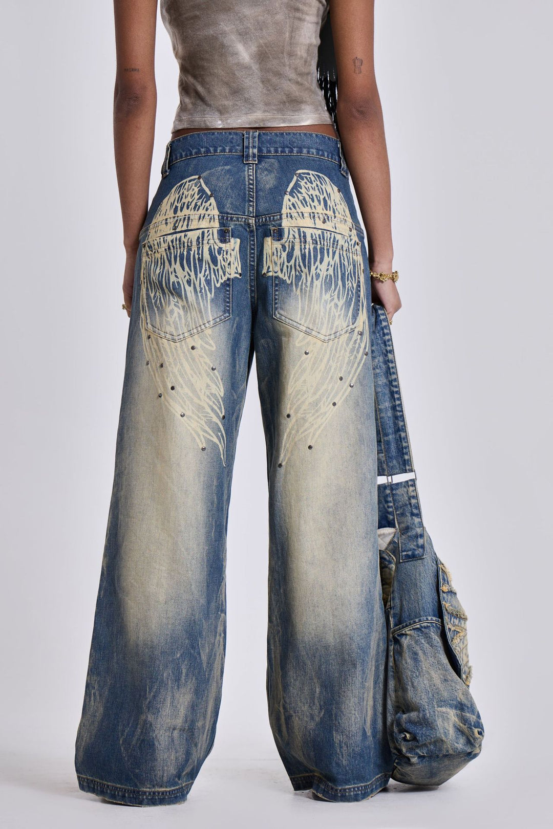 Damen weite Jeans mit kunstvollem Flügel-Design und einzigartigen Details R&B