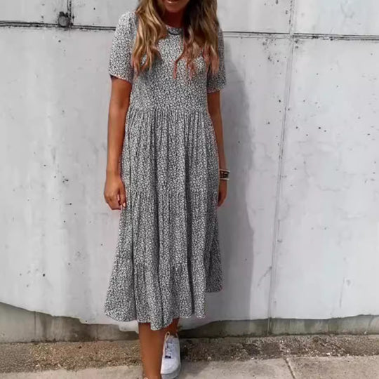 Damen Midi-Kleid mit zartem Blütenmuster und luftiger Silhouette Heidi-Mode