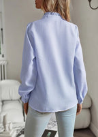 Modische Bluse mit langen Ärmeln und Streifenmuster