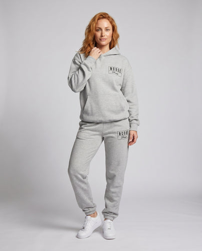 Damen lässiges Sportset mit Kapuzenpullover und bequemen Jogginghosen