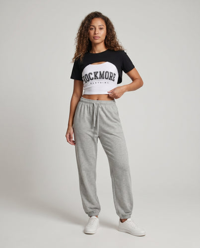 Damen lässiges Crop-Top mit asymmetrischem Schnitt und schickem Badge
