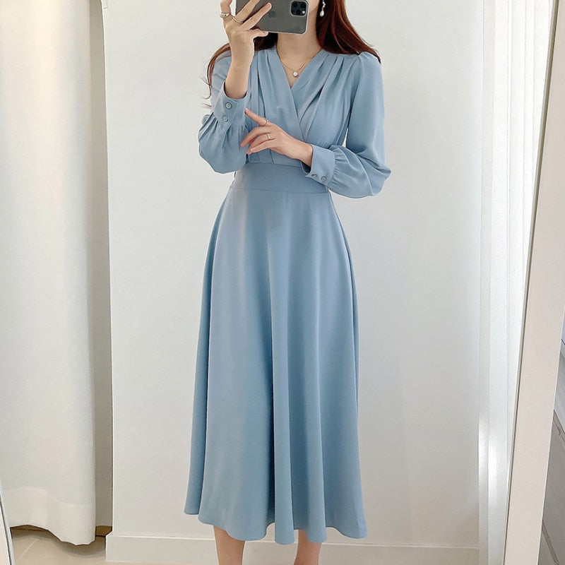 Elegantes Kleid mit Puffärmeln und V-Ausschnitt in A-Linie